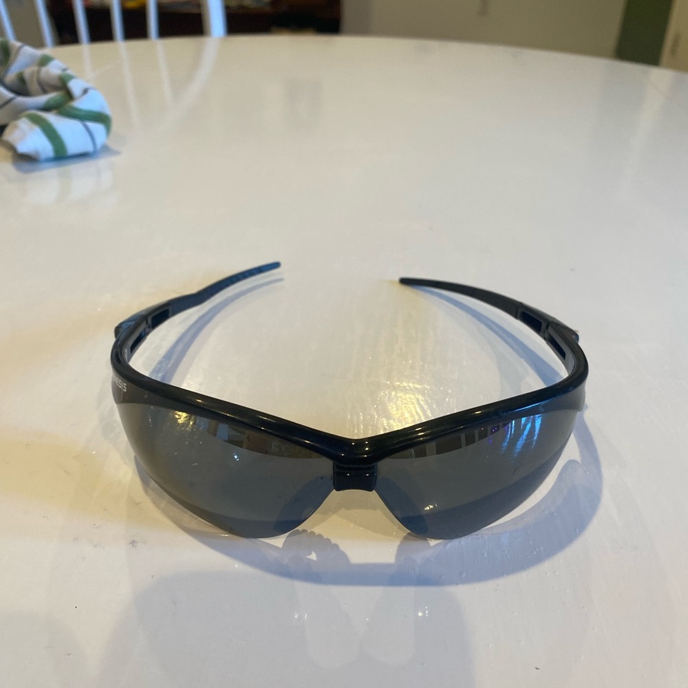 Nemesis Safety‎ Sunglasses – Wraparound Black Frame, Dark Lens, GUC Protective